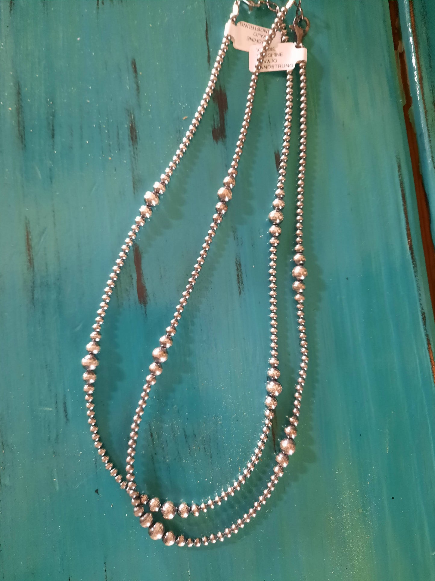 GRADUATED PEARL NECKLACES