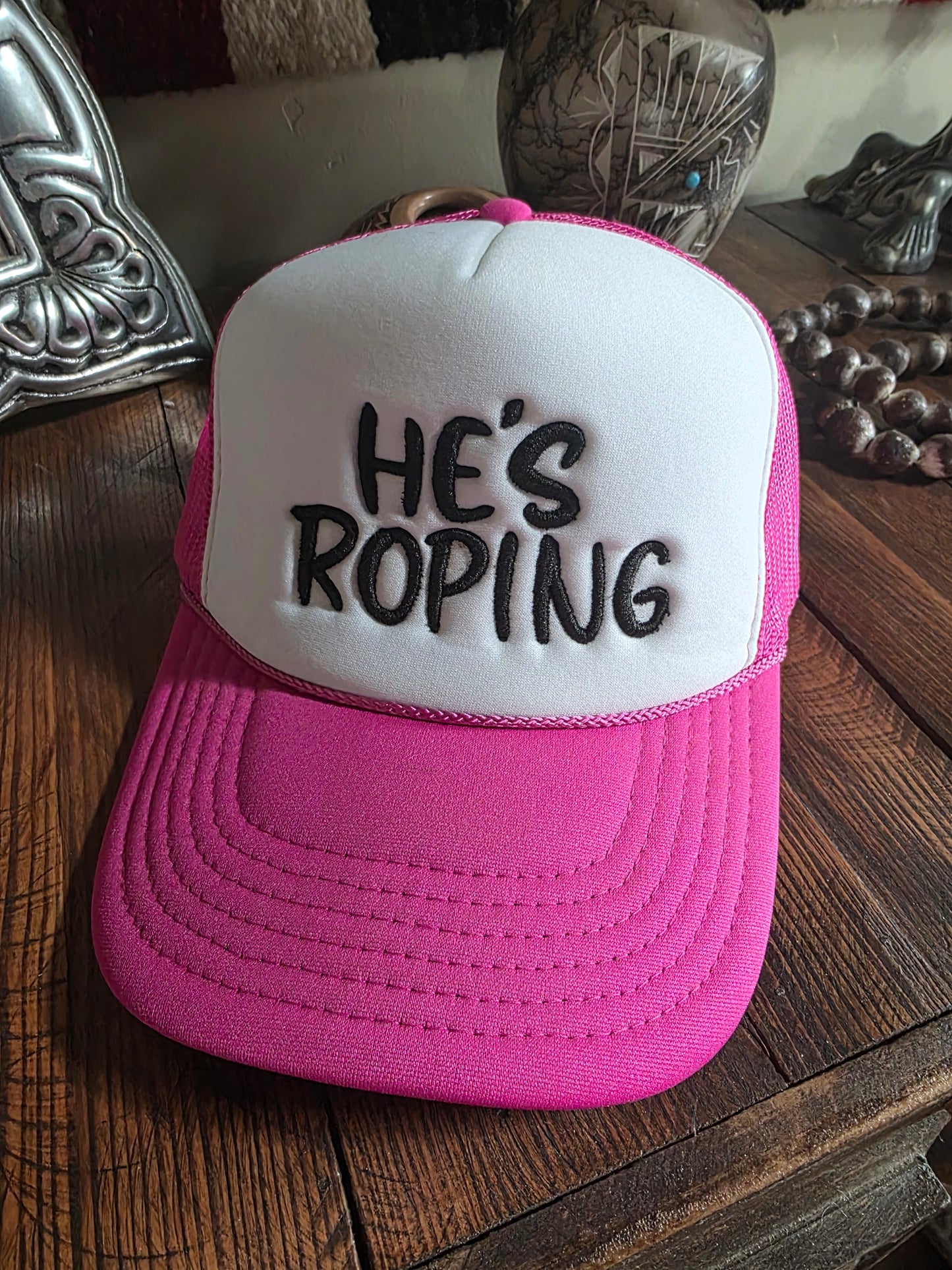 He's Roping Trucker cap