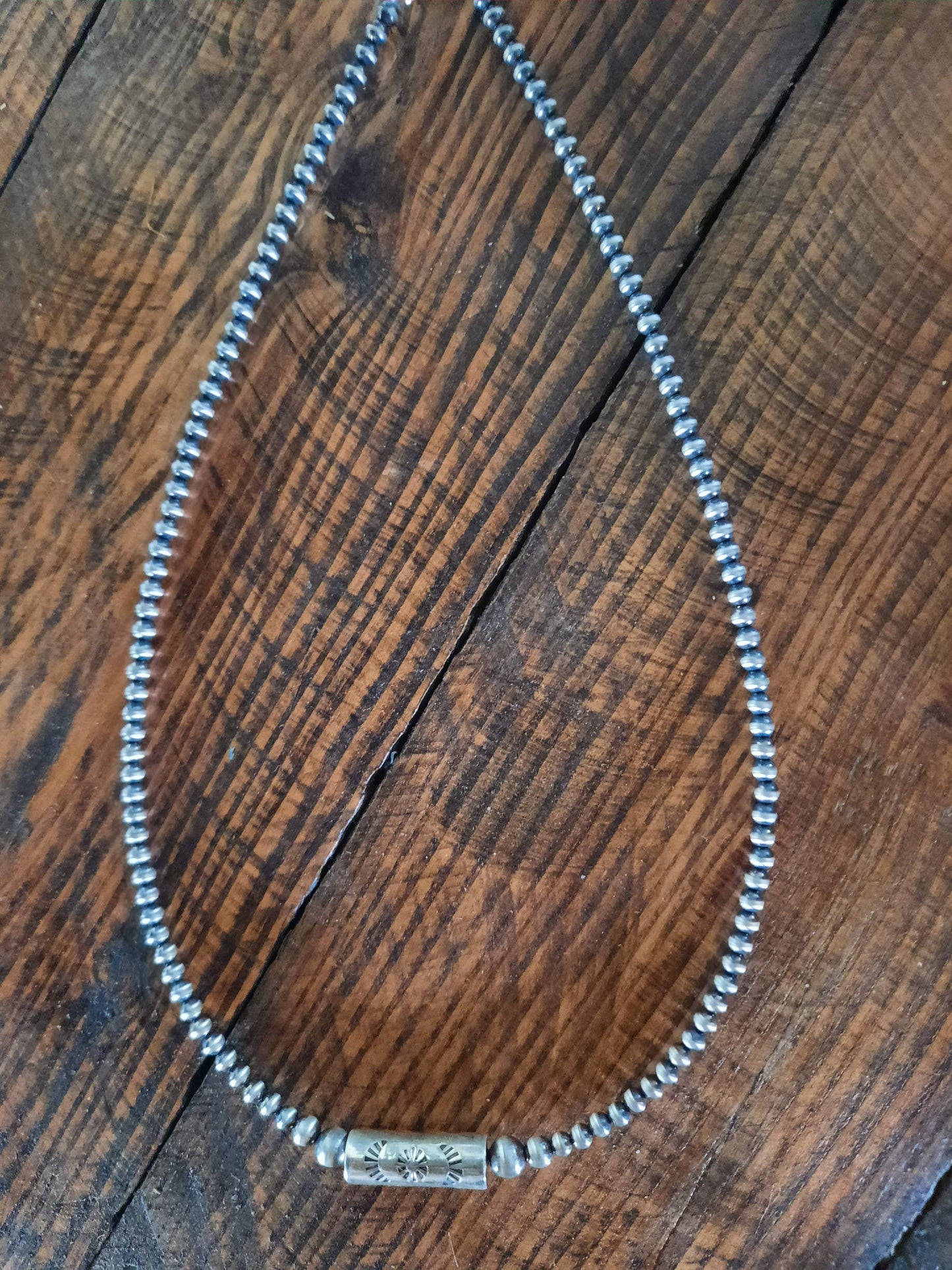 Navajo pearls with stamped barrel bead