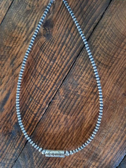 Navajo pearls with stamped barrel bead